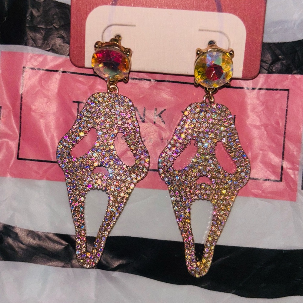Scream dangle earrings.